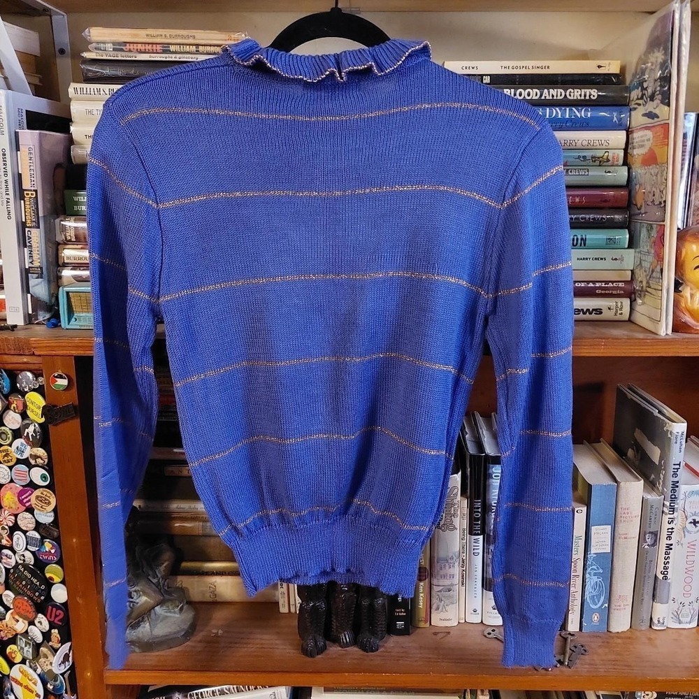 Vintage purple sweater with a ruffle collar and gold stripe detail. - Picture 2 of 7